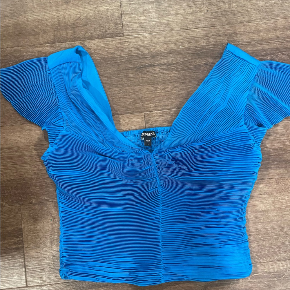 blue ruffle blouse